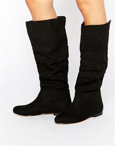 asos black knee boots|black knee high flat boots.